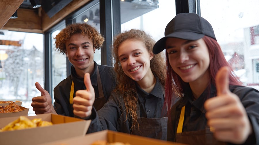 popcornmarketing_teenagers_picking_up_their_take_out_order_insi_6e10fd00-41c4-4155-9c7e-490818a250ef-1